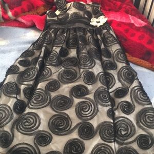 A little girls size 10 black and cream dress